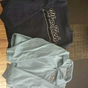 Two blue Wyotech sweatshirts